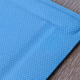 Illustration for article titled This Self-Rolling Yoga Mat Harnesses 90s Slap Bracelet Technology